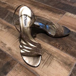 Gold/Bronze strappy high heals size 8.5 NWOT